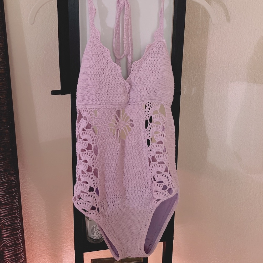 Crochet lavender swimsuit. Could also be styled as a bodysuit Size small.